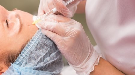 Woman receiving anti age injection